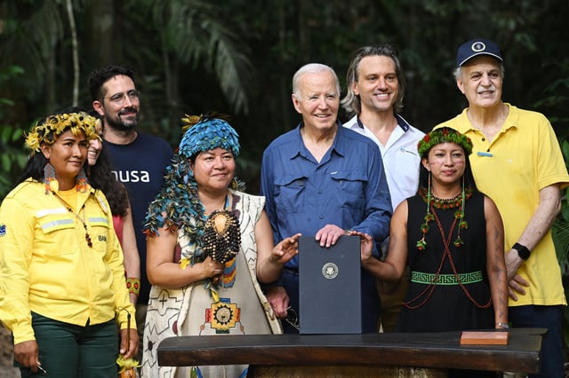President Biden signs a proclamation designating Nov. 17 as International Conservation Day  as he visits the Amazon Rainforest in Manaus, Brazil.