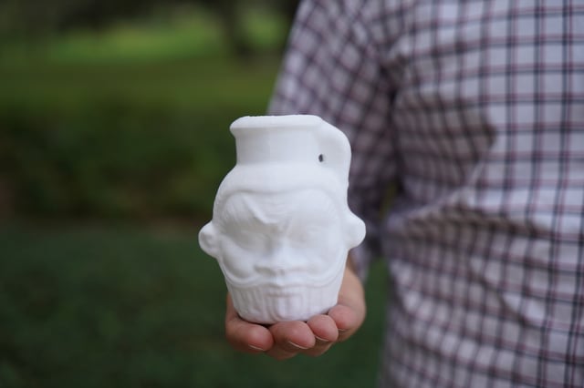 Replica of an ancient Egyptian Bes mug
