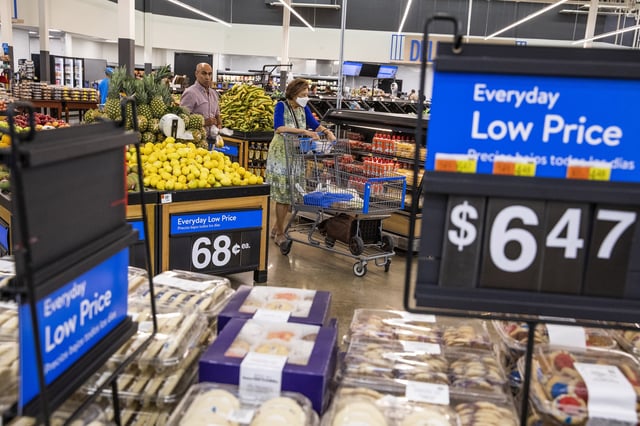 FILE - People buy groceries at a Walmart Superstore in Secaucus, New Jersey, July 11, 2024. 