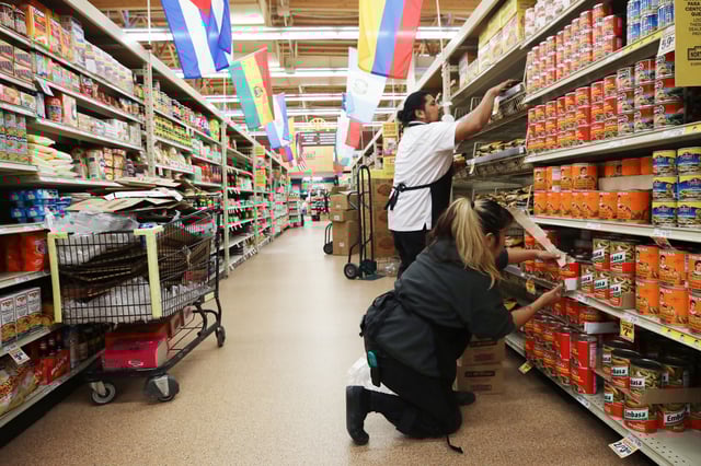Workers at Northgate Gonzalez Market in Los Angeles. 