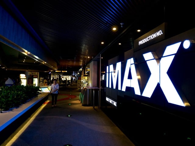 An image about IMAX to use AI to translate its original content in order to expand its global reach
