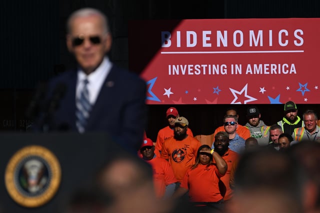 PHILADELPHIA, PENNSYLVANIA - OCTOBER 13:  Supporters listen as U.S. President Joe Biden speaks at Tioga Marine Terminal on October 13, 2023 in Philadelphia, Pennsylvania. Biden discussed how his Bidenomics agenda is creating good-paying union jobs, investing in infrastructure, accelerating the transition to a clean energy future, and combatting the climate crisis.(Photo by Mark Makela/Getty Images)