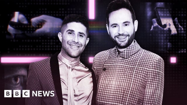 A composite image showing Benjamin Cohen and his husband Anthony James in black and white on a dark background, with an abstract background of neon pink lines with a rainbow motif of horizontal dots just showing through. There are also glimpses of figures texting on phones or close-ups of eyes in the background. Mr Cohen has dark hair, closely cropped at the sides and longer on top, stubble, and is wearing a tuxedo with a subtle pattern of crosses and a silk shirt. Mr James has brown hair and a beard, and is wearing an unusual high-fastening double-breasted jacket with a bold checked pattern.