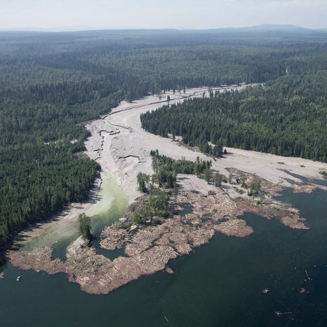 Contents from a tailings pond is pictured going down the Hazeltine Creek into Quesnel Lake near the town of Likely, B.C. on August, 5, 2014. Charges under the federal Fisheries Act have been laid against Imperial Metals Corp. more than 10 years after a tailings pond collapsed the Mount Polley mine, spilling more than 20 million cubic metres of waste water into B.C. Interior waterways. THE CANADIAN PRESS/Jonathan Hayward