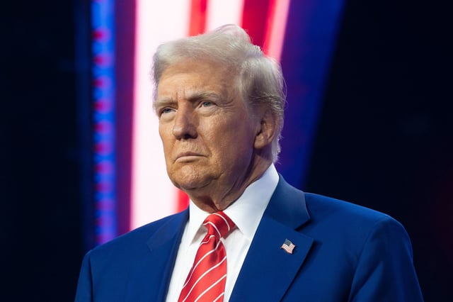 PHOENIX, ARIZONA - DECEMBER 22: U.S. President-elect Donald Trump looks on during Turning Point USA's AmericaFest at the Phoenix Convention Center on December 22, 2024 in Phoenix, Arizona. The annual four day conference geared toward energizing and connecting conservative youth hosts some of the country's leading conservative politicians and activists. (Photo by Rebecca Noble/Getty Images)