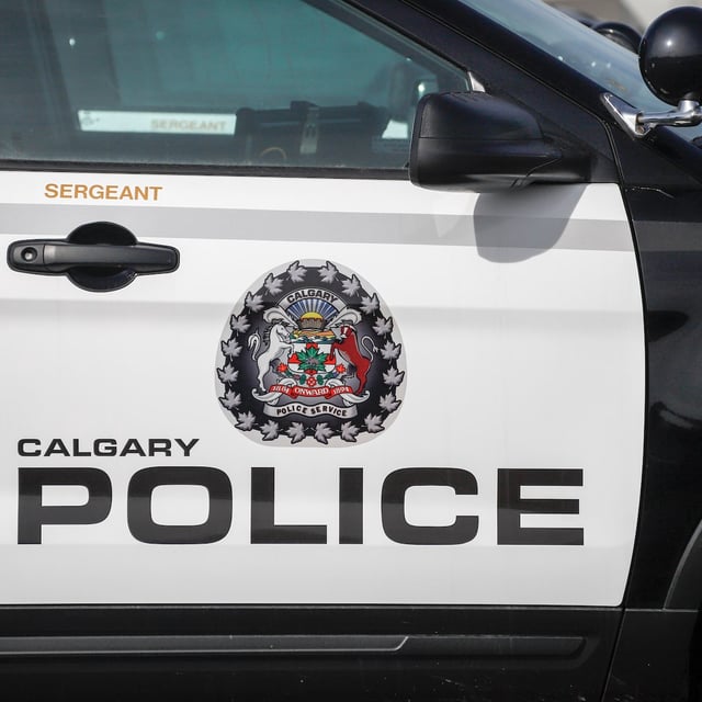 Police vehicles at Calgary Police Service headquarters in Calgary on April 9, 2020. THE CANADIAN PRESS/Jeff McIntosh
