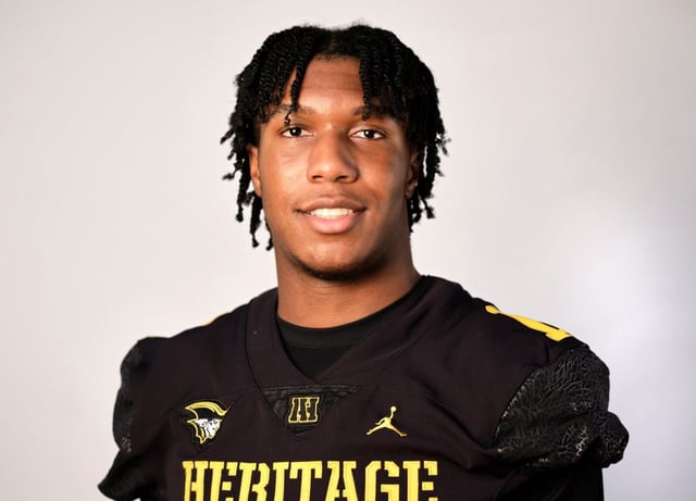 Former American Heritage star Xavier Lucas poses for an All-County photo on Dec. 13, 2023. Lucas, who played his first year of college at Wisconsin, is reportedly set to play for Mimi this year.
