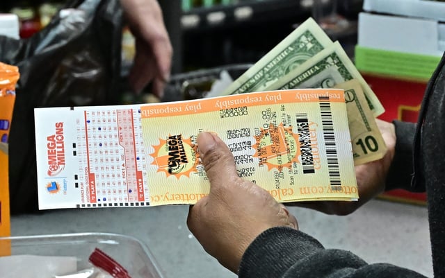 Lottery tickets for the Mega Millions lottery are purchased from a liquor store where winning tickets have been sold on December 27, 2024, in Hawthorne, California.