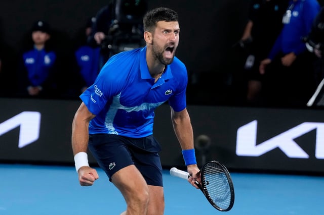 Novak Djokovic celebrates after defeating Carlos Alcaraz at the Australian Open.