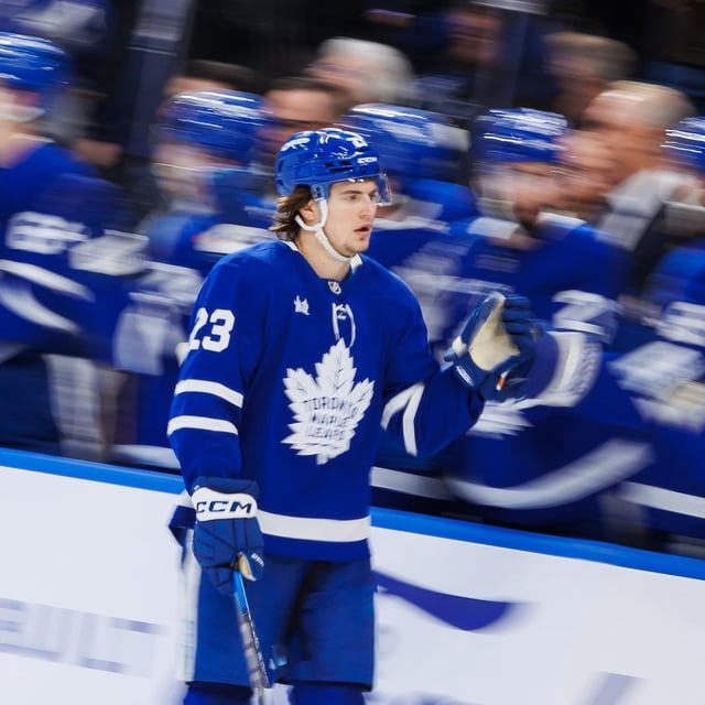 Toronto Maple Leafs Matthew Knies (23) celebrates a goal with the bench during third period NHL hockey action against the Tampa Bay Lightning, in Toronto, Monday, Jan. 20, 2025. THE CANADIAN PRESS/Cole Burston