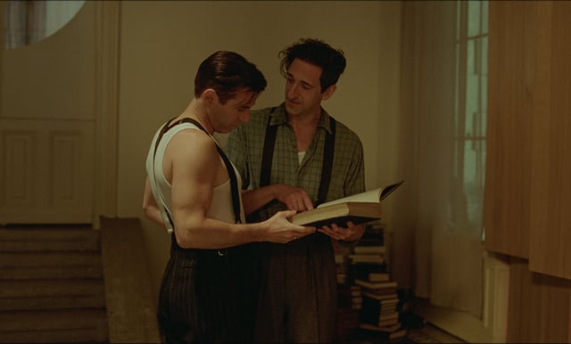 Alessandro Nivola and Adrien Brody in “The Brutalist”