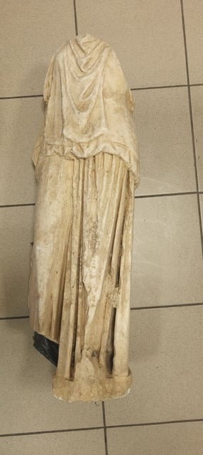 Pictured is a 2,000-year-old headless statue from ancient Greece's Hellenistic period.