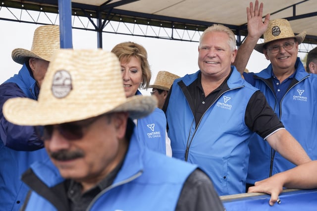 Ontario Premier Doug Ford takes part in the parade as he attends the International Ploughing Match in Lindsay, Ont., Tuesday, Oct. 1, 2024. 