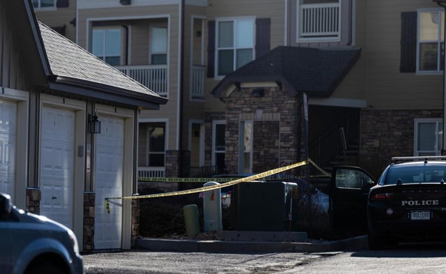 Police tape marks a crime scene where Colorado Springs police found children dead inside a condo of the Palomino Ranch Point complex after responding to a 911 call reporting a burglary, Tuesday, Dec. 19, 2023, in Colorado Springs, Colo. Kimberlee Singler, the mother suspected of killing two of her young children and wounding a third, was arrested Saturday, Dec. 30, in the United Kingdom, authorities said. (Parker Seibold/The Gazette via AP, File)