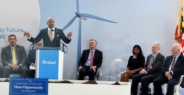 During a news conference, Gov. Wes Moore, at podium, announces Maryland&#39;s first offshore wind turbine component center which will be built at Tradepoint Atlantic. April 21, 2023. (Barbara Haddock Taylor/Baltimore Sun).