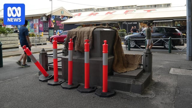 A concrete block that has been cordoned off.