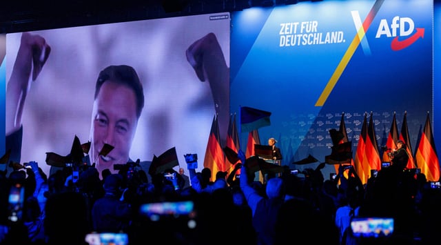 Elon Musk is seen on a large screen as Alice Weidel, co-leader of Germany's far-right Alternative for Germany (AfD) party, addresses an election campaign rally in Halle, Germany, Jan. 25, 2025. (AFP via Getty Images)