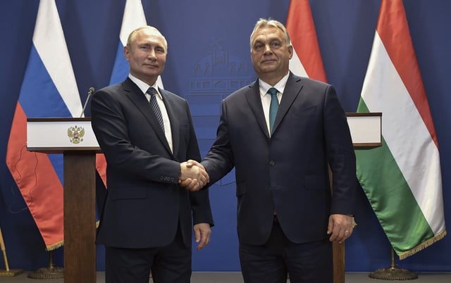 Vladimir Putin and Viktor Orban Shake Hands