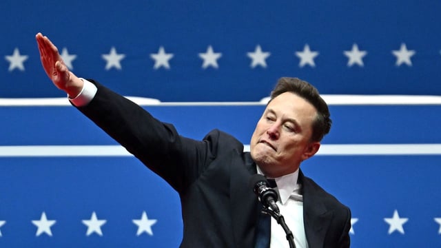 SpaceX CEO Elon Musk gives what scholars, journalists and rights groups said was a Hitlergruß, or Nazi salute. during the inaugural parade inside Capitol One Arena, in Washington, D.C., last week. Photo: Angela Weiss/AFP via Getty Images