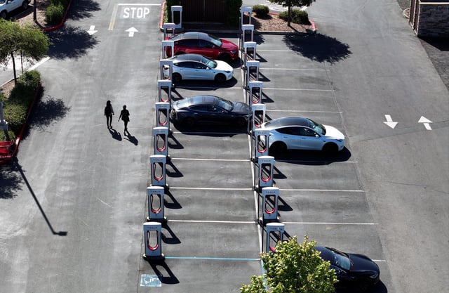 Tesla cars charge up at a Supercharger on May 2, 2024, in Petaluma, California.