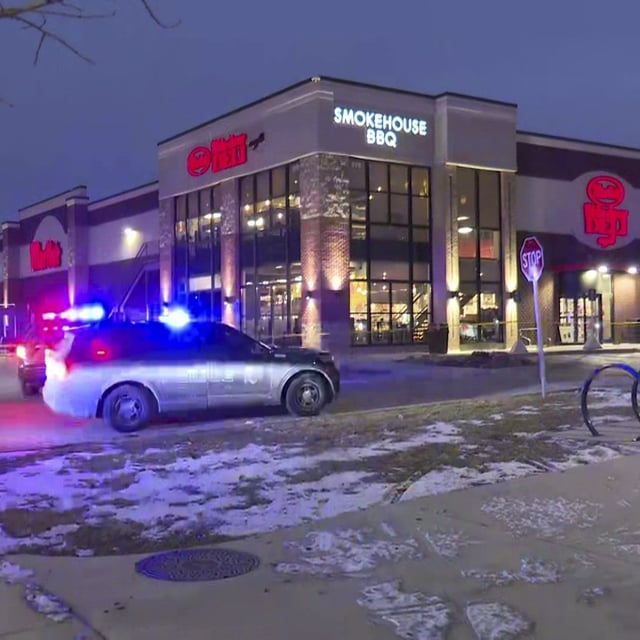 Police respond to the scene of a deadly shooting at a grocery store Monday, Jan. 27, 2025, in Elkhart, Ind. The shooting left 3 dead, 2 officers injured.