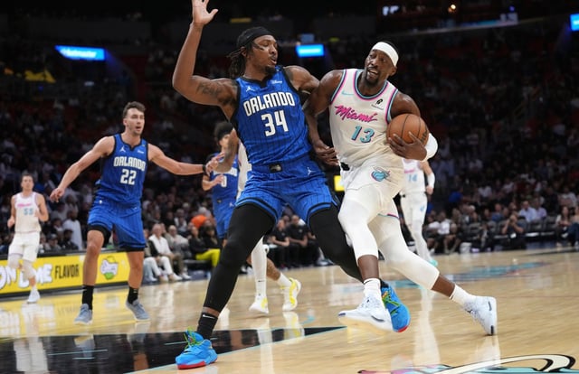 Heat center Bam Adebayo almost notches a triple-double with 26 points, 10 rebounds and 9 assists against the Magic on Monday in Miami. (Lynne Sladky/AP)