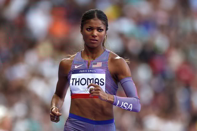 U.S. track star GabbyThomas says a group of middle-aged men have been stalking her at airports across the country.