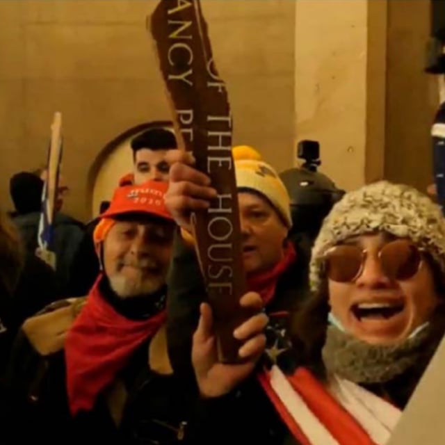 Emily Hernandez (right) pictured at the Capitol riot, January 6.