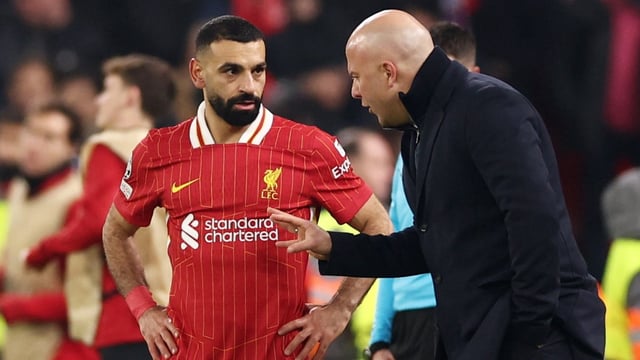 Slot, right, has made it clear that Liverpool want Salah to extend his contract beyond the summer