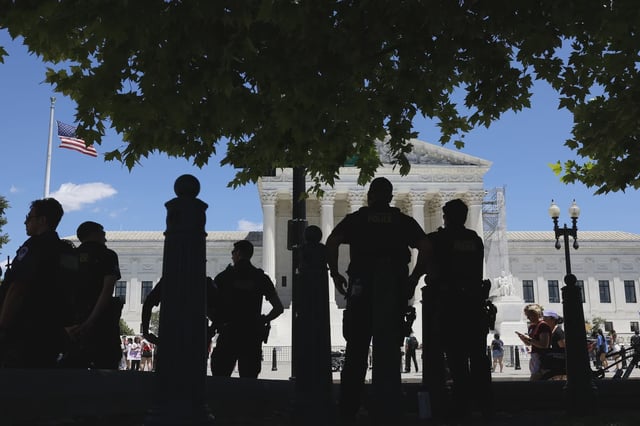 Abortion rights protesters outside of the U.S. Supreme Court on June 24, 2024.