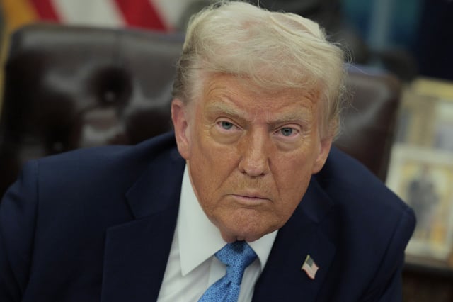 U.S. President Donald Trump talks to reporters after signing an executive order, &#34;Unleashing prosperity through deregulation,&#34; in the Oval Office on January 31, 2025 in Washington, DC.
