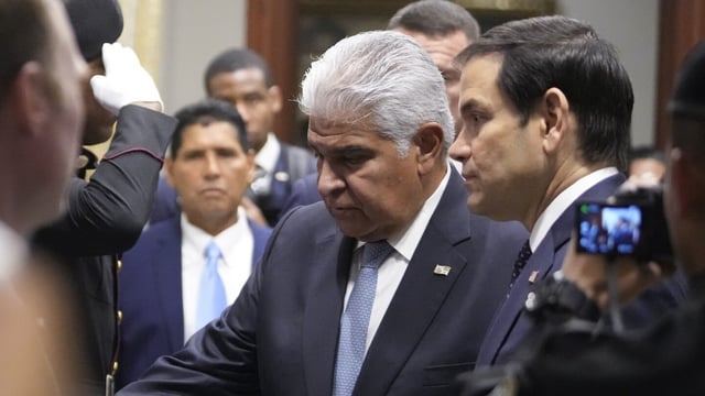 Panama's President Jose Mulino, left, and U.S. Secretary of State Marco Rubio arrive for a meeting at the presidential palace in Panama City, Sunday, Feb. 2, 2025. (AP Photo/Mark Schiefelbein, Pool)