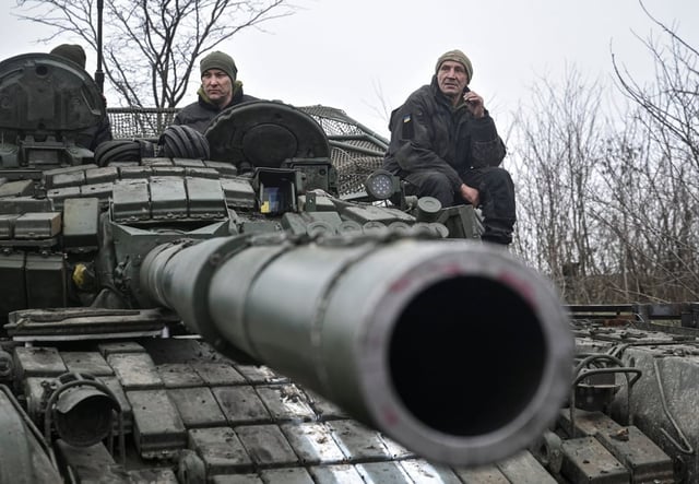 Ukrainian servicemen sit atop a tank in the Zaporizhzhia region last month. Photo: Reuters