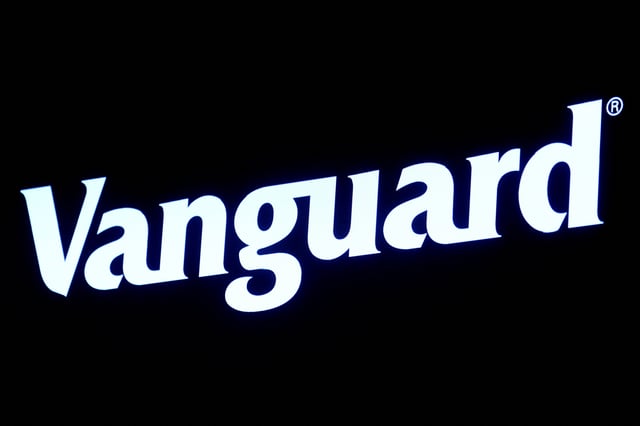 The logo for Vanguard is displayed on a screen on the floor of the New York Stock Exchange (NYSE) in New York City, U.S., June 1, 2022.  REUTERS/Brendan McDermid//File Photo