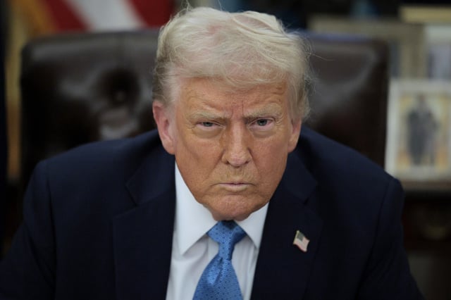 President Donald Trump talks to reporters after signing an executive order, &#34;Unleashing prosperity through deregulation,&#34; in the Oval Office on January 31, 2025 in Washington, DC.