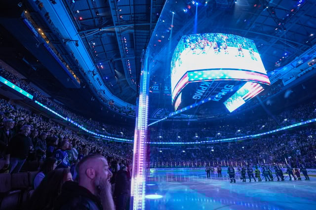 Fans boo as the U.S. national anthem is sung before the Vancouver Canucks and Detroit Red Wings play an NHL hockey game in Vancouver, B.C., Sunday, Feb. 2, 2025. 