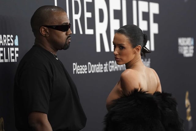Kanye West, left, and Bianca Censori arrive at the 67th annual Grammy Awards.