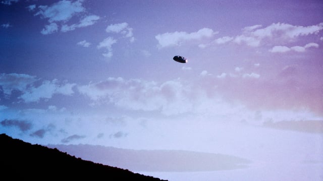 1980s Unidentified Flying Object Ufo In Hazy Sky Alien Saucer Space Ship Science Fiction Sci-Fi Suspicious Aerial Phenomenon.