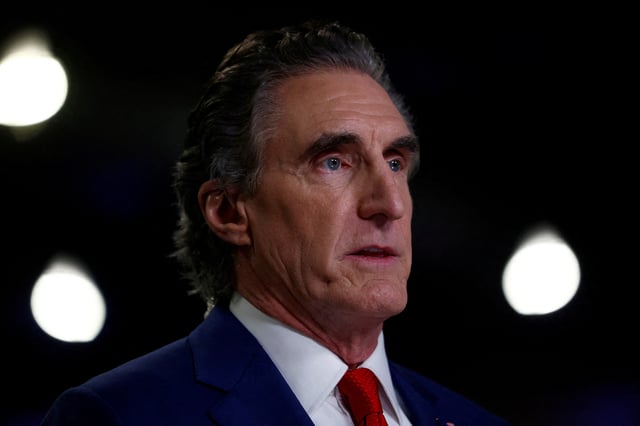 North Dakota Governor Doug Burgum speaks in the spin room, ahead of the debate between Republican presidential nominee and former U.S. President Donald Trump and Democratic presidential nominee and U.S. Vice President Kamala Harris, in Philadelphia, Pennsylvania, U.S., September 10, 2024. REUTERS/Evelyn Hockstein/File Photo