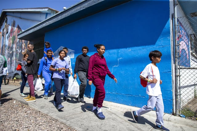 A migrant family from Venezuela arrives to the shelter run by the Sacred Heart Church in El Paso, Texas, on May 12, 2023.