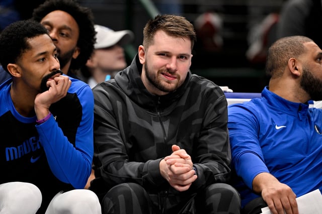Former Dallas Mavericks guard Luka Doncic looks on from the team bench during the second quarter against the Washington Wizards.