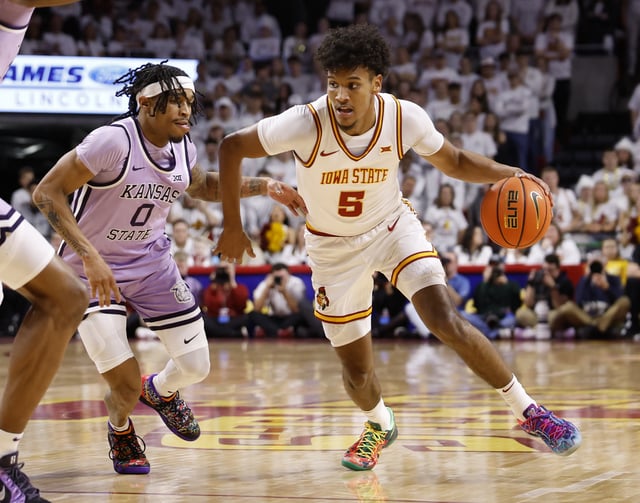 Curtis Jones #5 of the Iowa State Cyclones, drives the ball as Dug McDaniel #0 of the Kansas State Wildcats defends in the first half of play at Hilton Coliseum on February 1, 2025, in Ames, Iowa.