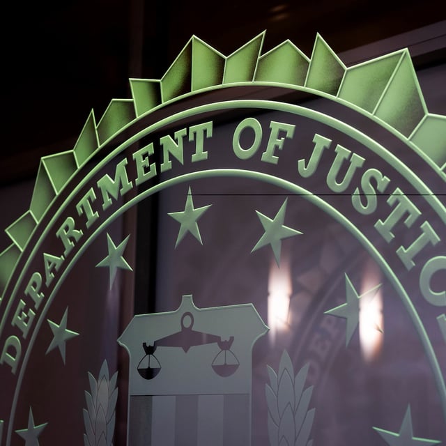 The words Department of Justice are displayed at the FBI field office in Portland, Ore., Thursday, Jan. 16, 2025. (AP Photo/Jenny Kane)