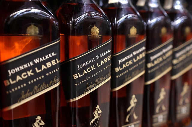 Johnnie Walker bottles are displayed on a shelf in a supermarket in Sarajevo, Bosnia and Herzegovina, October 29, 2024. REUTERS/Dado Ruvic/File Photo