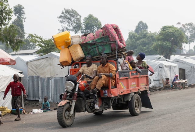 People who were displaced return home days after the M23 rebel group seized the town of Goma, near Goma, in North Kivu, Democratic Republic of the Congo, February 3, 2025. REUTERS/Arlette Bashizi/File Photo