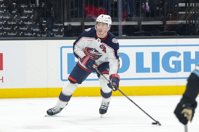 Jan 31, 2025; Salt Lake City, Utah, USA;  Columbus Blue Jackets defenseman Zach Werenski (8) looks to shoot the puck against the Utah Hockey Club during the first period at Delta Center. Mandatory Credit: Chris Nicoll-Imagn Images/File Photo