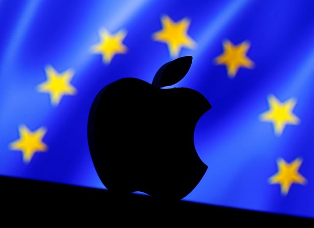 A 3D printed Apple logo is seen in front of a displayed European Union flag in this illustration taken September 2, 2016.