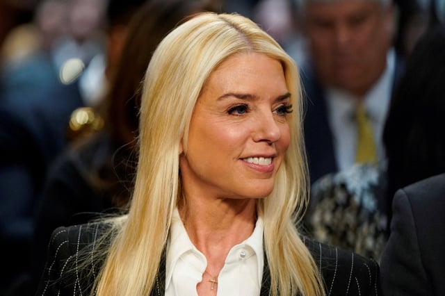 Pam Bondi, U.S. President-elect Donald Trump's nominee to be attorney general, reacts on the day of a Senate Judiciary Committee confirmation hearing on Capitol Hill in Washington, U.S., January 15, 2025. REUTERS/Elizabeth Frantz/File Photo