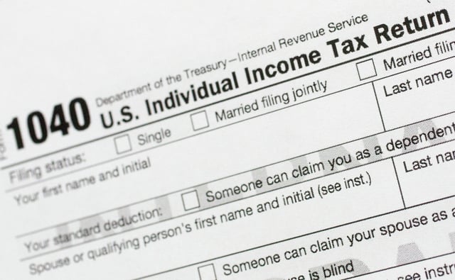 The Internal Revenue Service 1040 tax form for 2022 is seen on April 17, 2023. Tax-filing season for 2025 opened Jan. 27. The IRS has tools to track a refund status. 