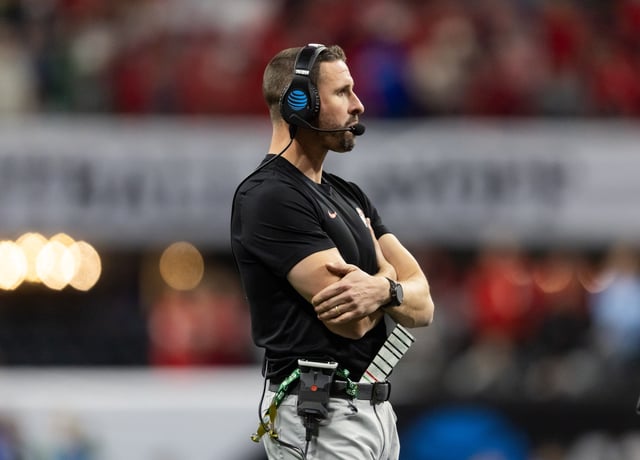 Jan 20, 2025; Atlanta, GA, USA; Ohio State Buckeyes wide receivers coach Brian Hartline against the Notre Dame Fighting Irish during the CFP National Championship college football game at Mercedes-Benz Stadium. Mandatory Credit: Mark J. Rebilas-Imagn Images/File Photo